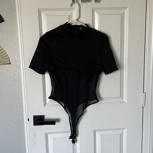 Women’s black fashion nova mesh body suit